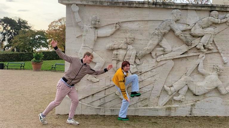 Arthur goofing around with a freind at a sculpture garden