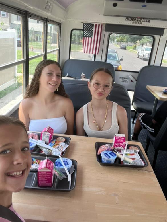 On the school bus eating lunch