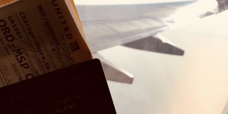 Passport through the plane window