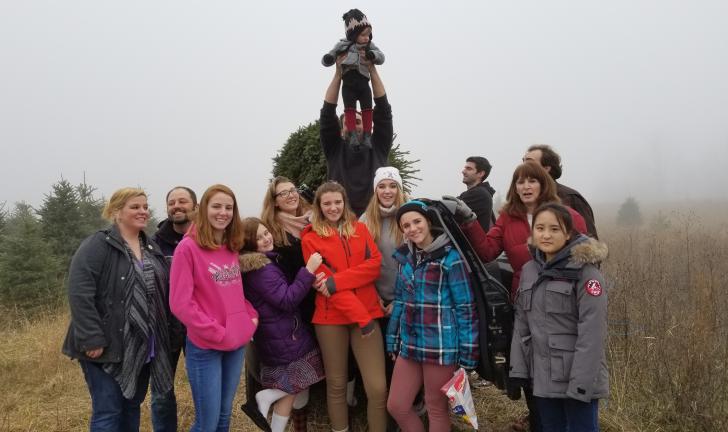 Family in a foggy field