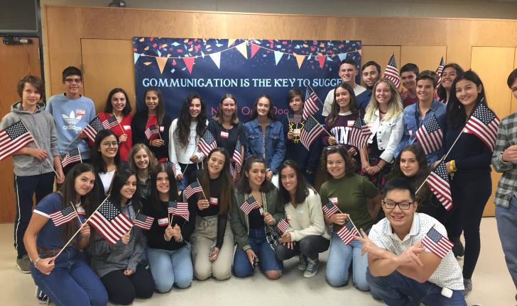 Orientation group with U.S. flags