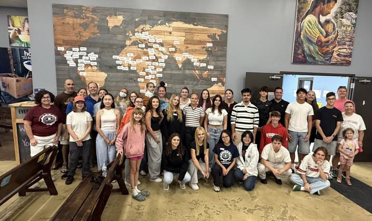Feed My Starving Children with Eileen, Didi, and Cole with students and families