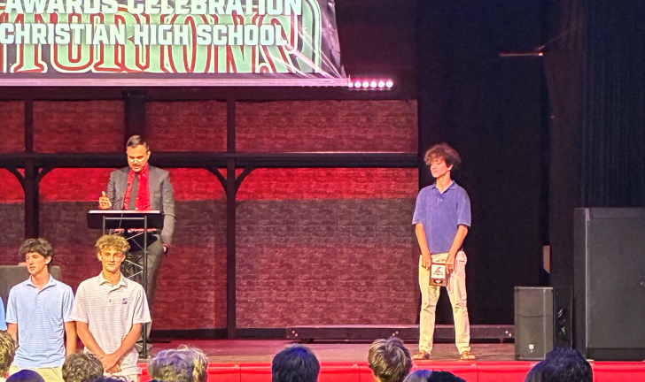 Teo receiving Teammate Award
